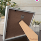 Crafted Memoirs Photo Frame By Printhaws Creations, Back View Of Matte White Frame Showing MDF Backing With Foldable Easel And Sawtooth Hanger